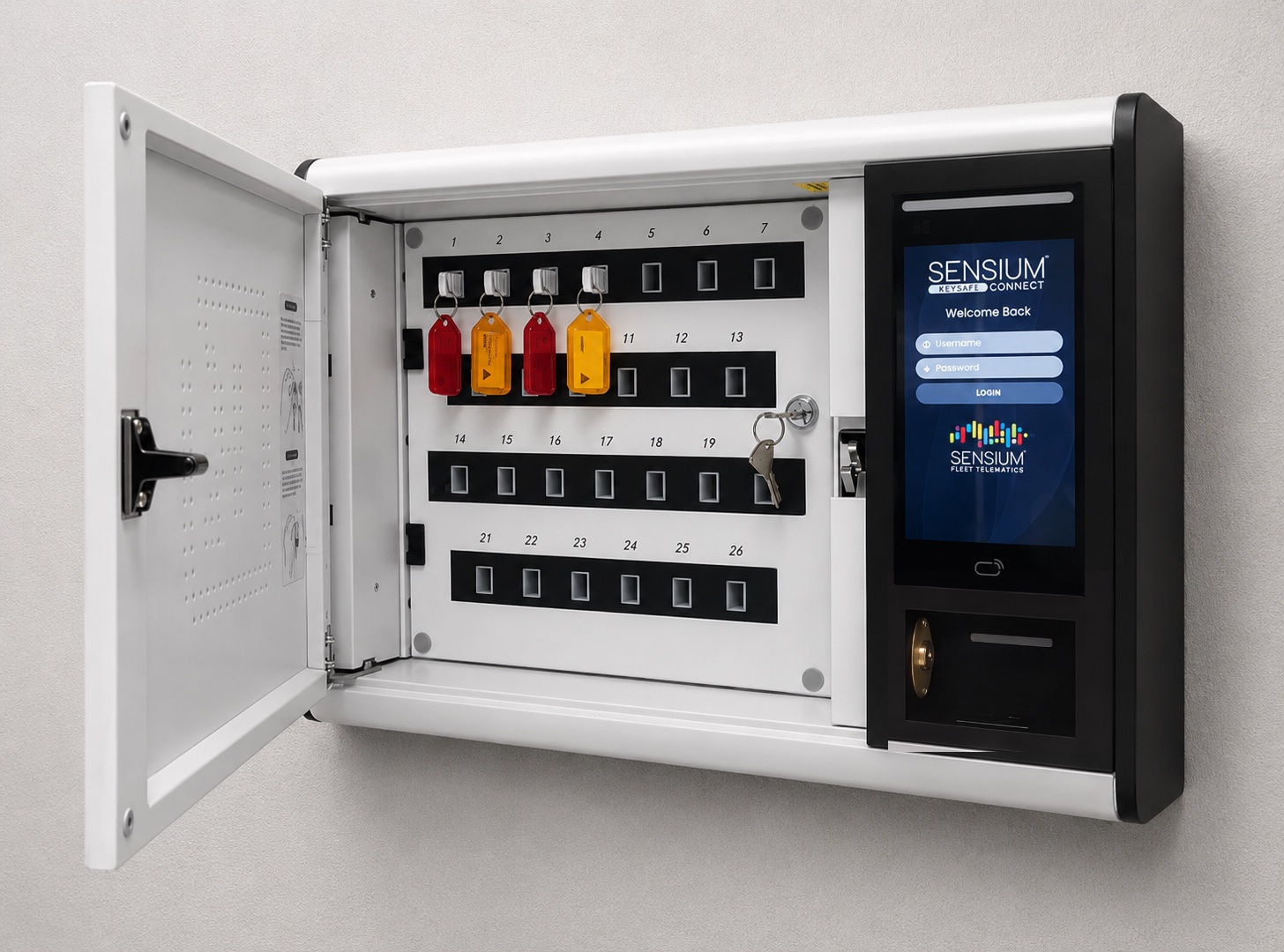 Sensium Electronic Key Cabinet, wall-mounted and open: numbered key slots with colour-tagged keys, a keyed drawer and the Sensium Connect touchscreen.